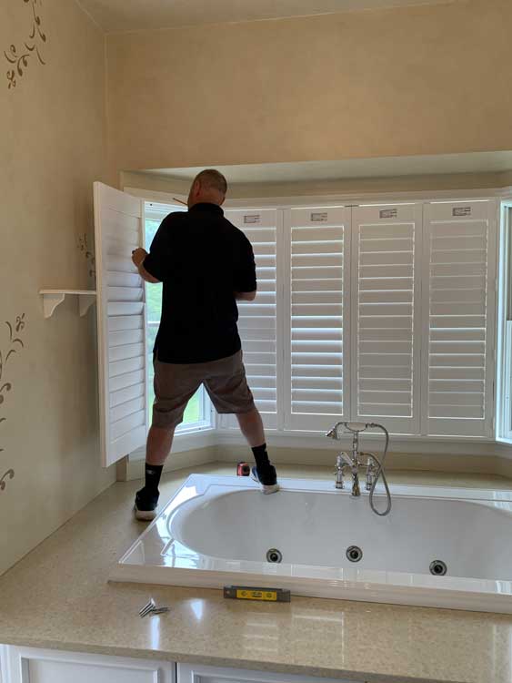 Berniker-Decorators-install-bathroom-shutters